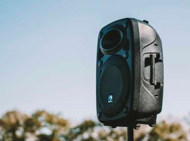 a black and white camera on a pole